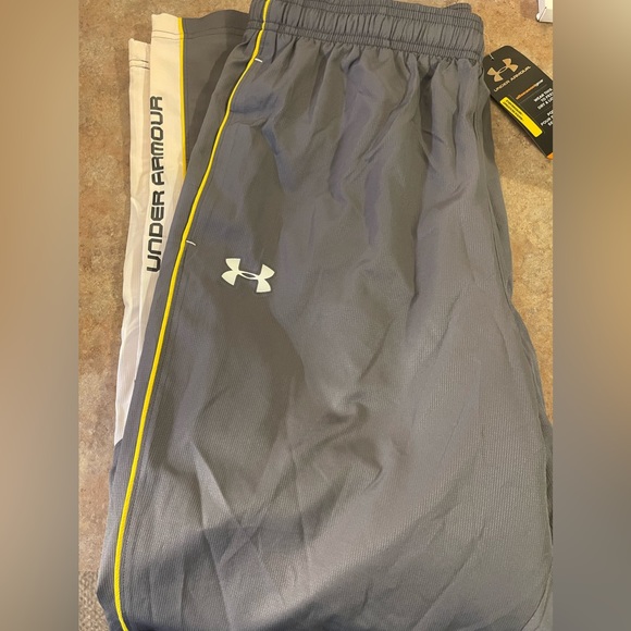 Under armor size large, all season gear, Slicky pants. Gray and yellow. - Picture 3 of 4